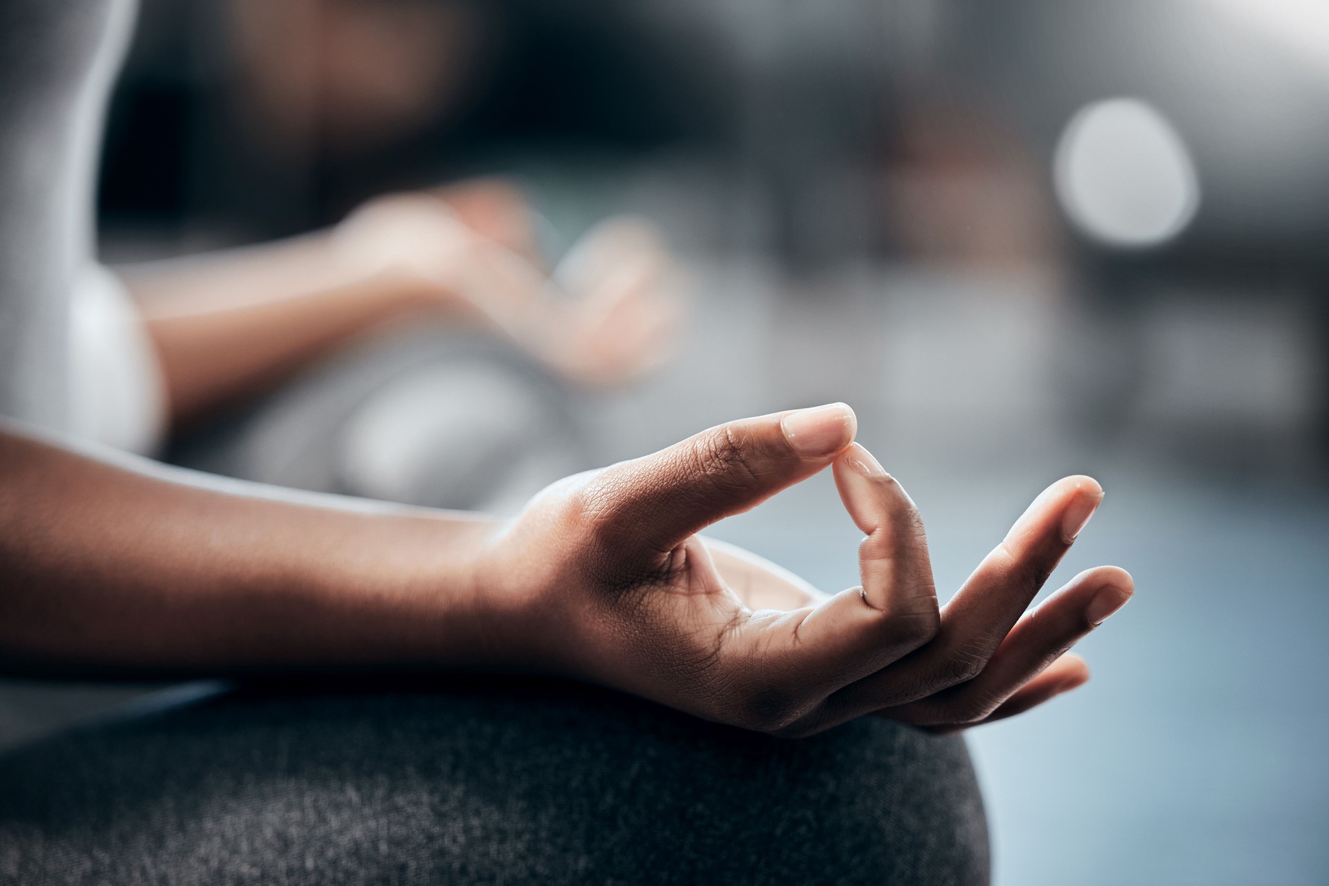 Cropped shot of an unrecognizable young woman doing some deep meditation at the gym